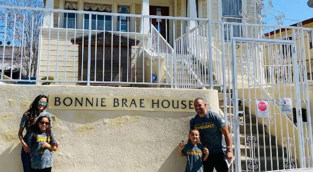 Dr. Caleb Cooper and his son, Caleb Titus Cooper (Right) Erica Cooper and daughter Izabella (Left)